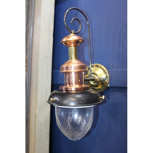 110 - Brass and copper wall light with bracket  {H 37cm x W 14cm x D 18cm}.