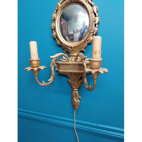 111 - Pair of exceptional quality giltwood mirrored two branch wall sconces in the Adams manner {76 cm H x... 