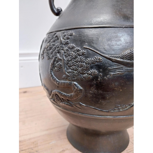 118 - Early 20th C. Japanese bronze vase decorated with river scenes {30 cm H x 20 cm Dia.}.