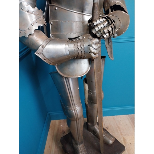 120 - Good quality metal suit of armour {202 cm H x 79 cm W x 46 cm D}.