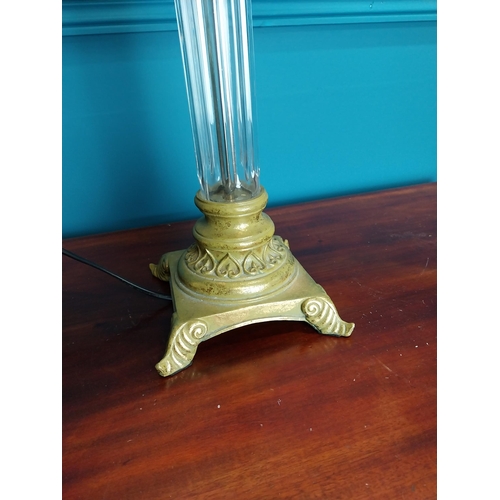 123 - Decorative resin and gilt Corinthian column table lamp {80 cm H x 40 cm W x 40 cm D}.