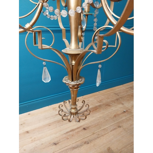 124 - Good quality gilded metal ten branch chandelier with cut crystal droplets in the Rocco manner {138 c... 
