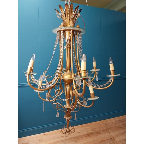 125 - Good quality gilded metal ten branch chandelier with cut crystal droplets in the Rocco manner {138 c... 