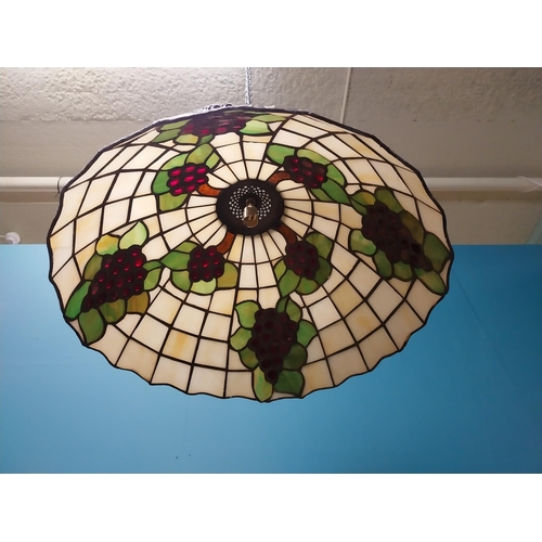 143 - Leaded glass lantern decorated with grape vines in the Tiffany style {70 cm H x 52 cm Dia.}.
