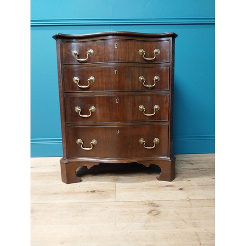 146 - Good quality 19th C. mahogany serpentine front bachelors chest with four graduated drawers and brass... 
