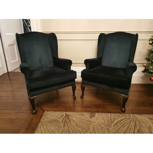 149 - Pair of green velvet upholstered wingback armchairs {110cm H x 79cm W x 85cm D}