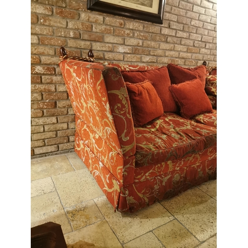 150 - Decorative red and cream upholstered two seater couch with cushions, with drop down sides  in the Du... 