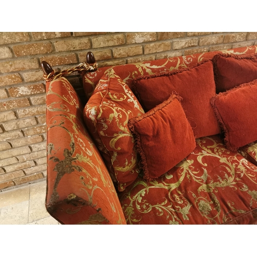 150 - Decorative red and cream upholstered two seater couch with cushions, with drop down sides  in the Du... 