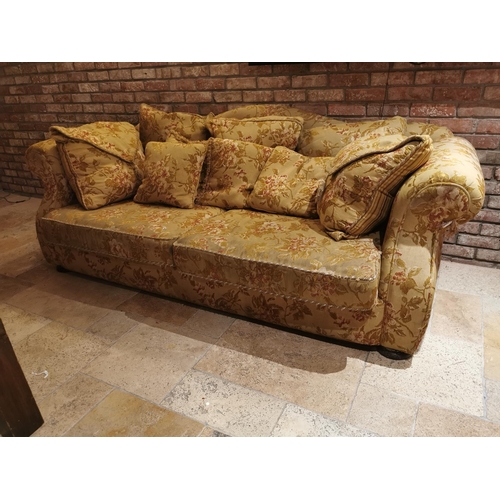 151 - Decorative cream upholstered three seater camel backed couch with cushions {85 cm H x 215 cm W x 103... 