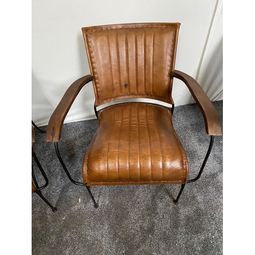 160 - Pair of leather and steel designer armchairs.