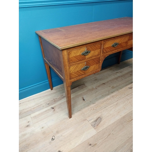 163 - Edwardian satinwood and inlaid desk with central drawer flanked by four short drawers on tapered leg... 