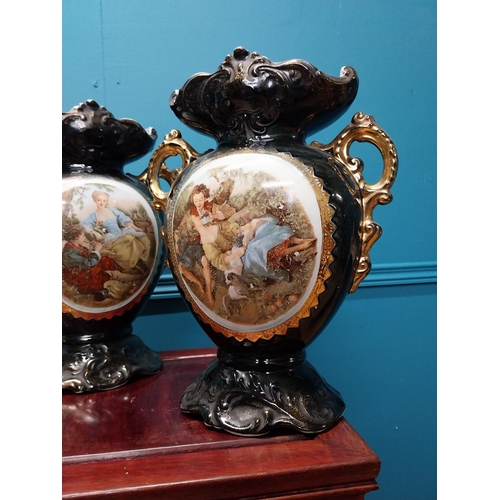 177 - Pair of 19th C. hand painted ceramic vases with gilded decoration. {32 cm H  x 22 cm W x 12 cm D}