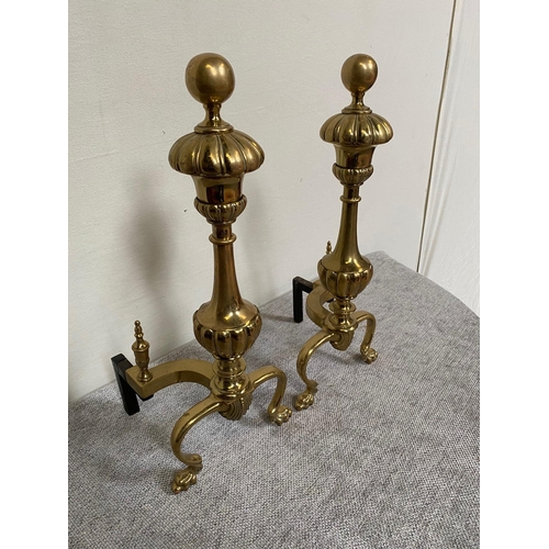 197 - Pair of brass fire dogs {54 cm H}.