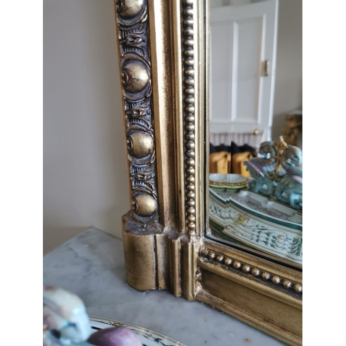 2 - Decorative gilt overmantle mirror {150 cm H x 160 cm W}.