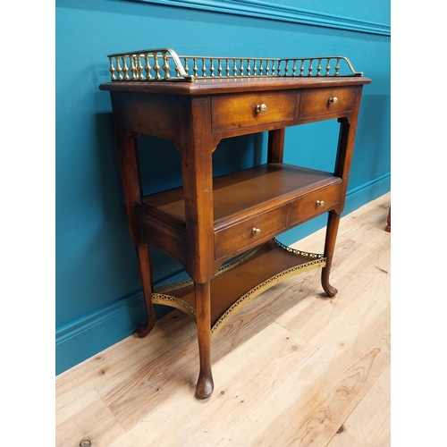 229 - Good quality walnut side table with brass gallery back on pad feet {85 cm H x 70 cm W x 36 cm D}