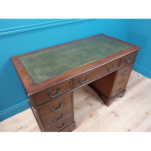 233 - Good quality mahogany pedestal desk with inset leather top and brass handles raised on bracket feet ... 