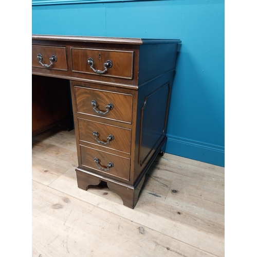 233 - Good quality mahogany pedestal desk with inset leather top and brass handles raised on bracket feet ... 