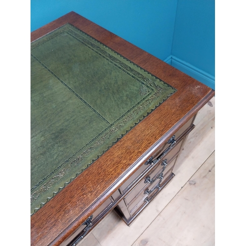 233 - Good quality mahogany pedestal desk with inset leather top and brass handles raised on bracket feet ... 