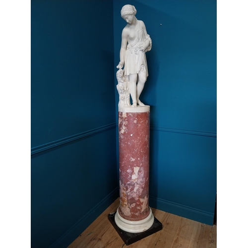 242 - 19th C. Italian carved Carrera marble statue of a Grecian Lady picking roses {84cm H x 30cm Dia.}