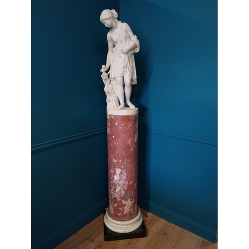 242 - 19th C. Italian carved Carrera marble statue of a Grecian Lady picking roses {84cm H x 30cm Dia.}