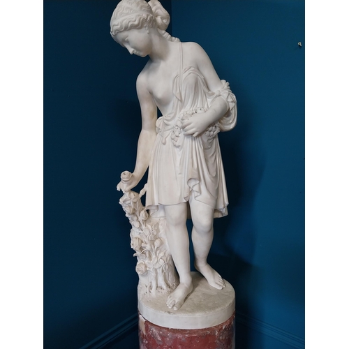 242 - 19th C. Italian carved Carrera marble statue of a Grecian Lady picking roses {84cm H x 30cm Dia.}