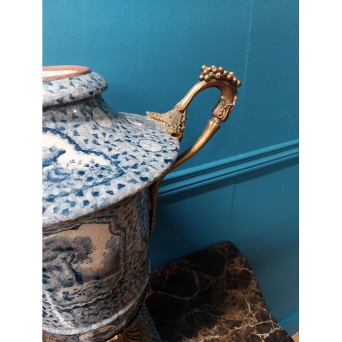 256 - French blue and white ceramic urn with ormolu mounts {47 cm H x 41 cm W x 22 cm D}.