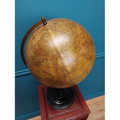 259 - 19th C. world globe raised on mahogany stand {60 cm H x 32 cm Dia.}.