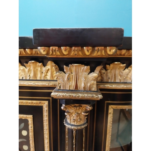 262 - 19th. C. ebonised rosewood inverted breakfront credenza, the cabinet ornately decorated with gilded ... 