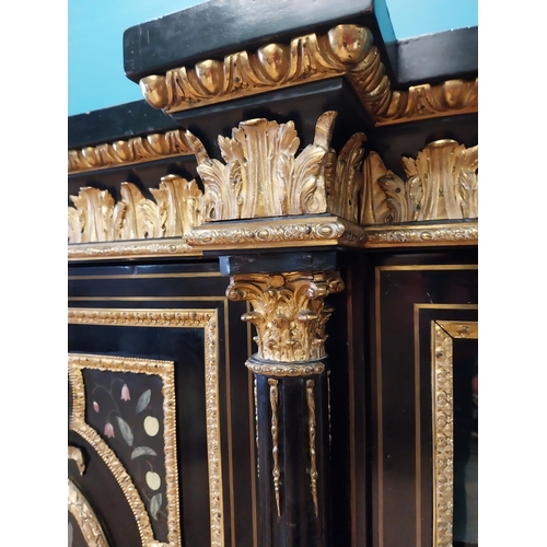 262 - 19th. C. ebonised rosewood inverted breakfront credenza, the cabinet ornately decorated with gilded ... 