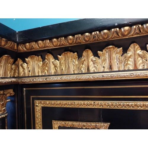 262 - 19th. C. ebonised rosewood inverted breakfront credenza, the cabinet ornately decorated with gilded ... 