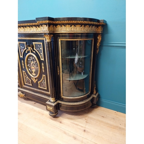 262 - 19th. C. ebonised rosewood inverted breakfront credenza, the cabinet ornately decorated with gilded ... 