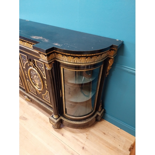 262 - 19th. C. ebonised rosewood inverted breakfront credenza, the cabinet ornately decorated with gilded ... 