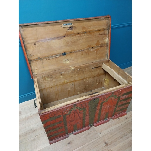 297 - Early 20th C. painted pine trunk with brass stud decoration {67 cm H x 123 cm W x 67 cm D}.