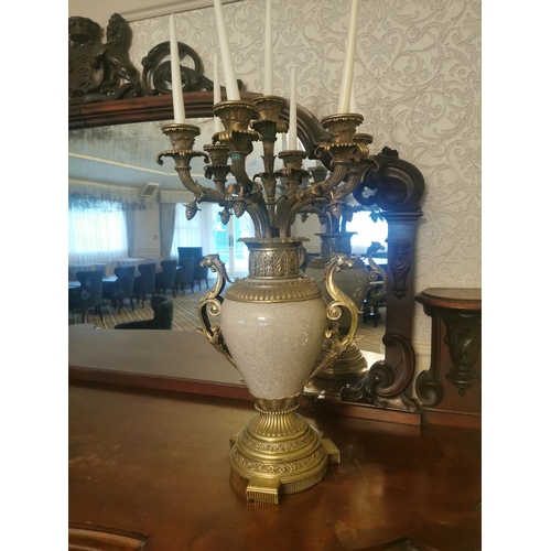 301 - Pair of exceptional quality gilded brass and ceramic seven branch candelabra {87 cm H x 49 cm Dia.}.