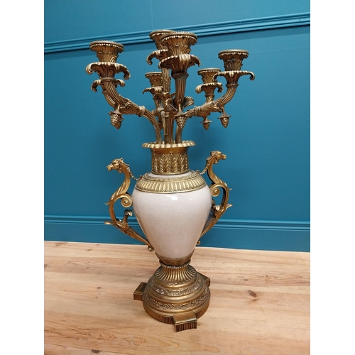 301 - Pair of exceptional quality gilded brass and ceramic seven branch candelabra {87 cm H x 49 cm Dia.}.