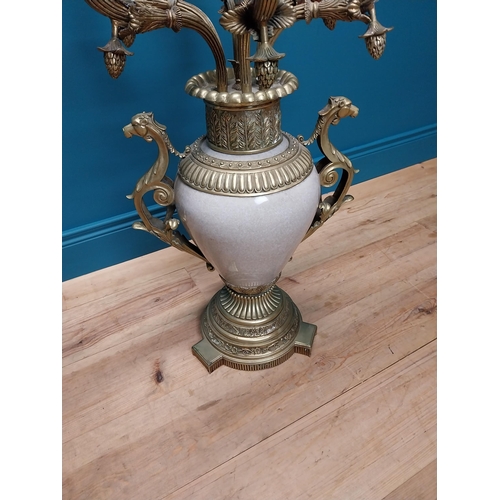 301 - Pair of exceptional quality gilded brass and ceramic seven branch candelabra {87 cm H x 49 cm Dia.}.