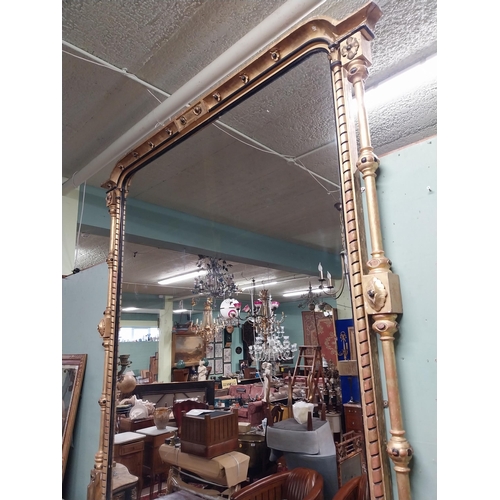 302 - 19th C. giltwood and ebonised overmantle mirror {205 cm H x 195 cm W}.