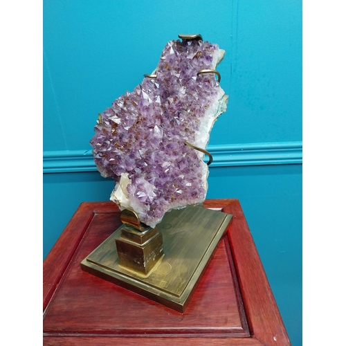 308 - Rare Amethyst crystal cluster mounted on brass stand {32 cm H x 17 cm W x 20 cm D}.