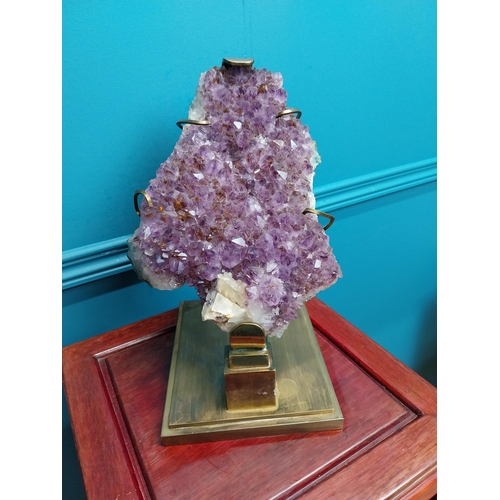 308 - Rare Amethyst crystal cluster mounted on brass stand {32 cm H x 17 cm W x 20 cm D}.