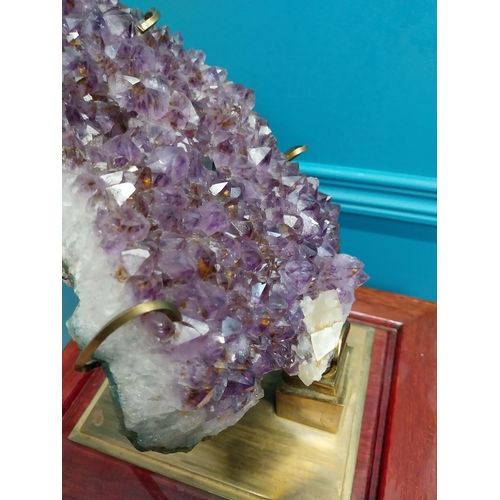 308 - Rare Amethyst crystal cluster mounted on brass stand {32 cm H x 17 cm W x 20 cm D}.