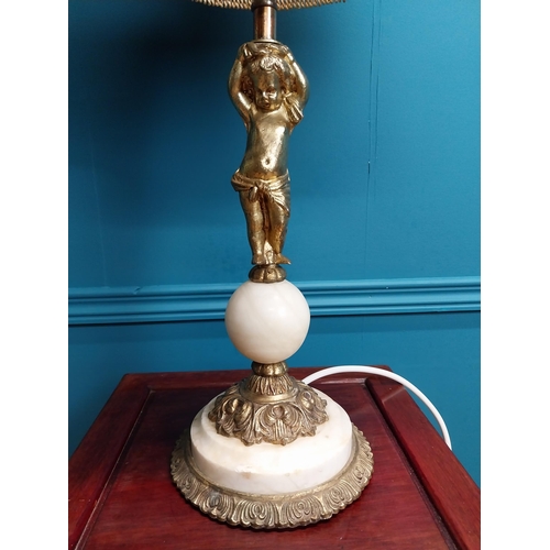 316 - Decorative spelter and onyx table lamp decorated with cherub {69 cm H x 43 cm W x 26 cm D}.