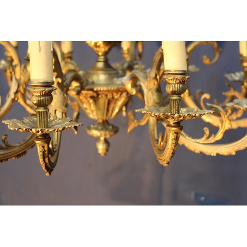 324 - French bronze nine branch chandelier decorated with acanthus leaf and cherubs {H 84cm x Dia 78cm}.