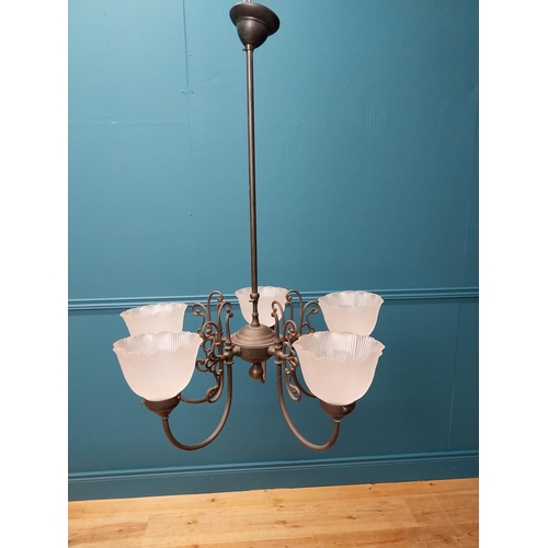 332 - Decorative five branch metal chandeliers with Holophane style glass  shades {85 cm H x 64 cm Dia.}.