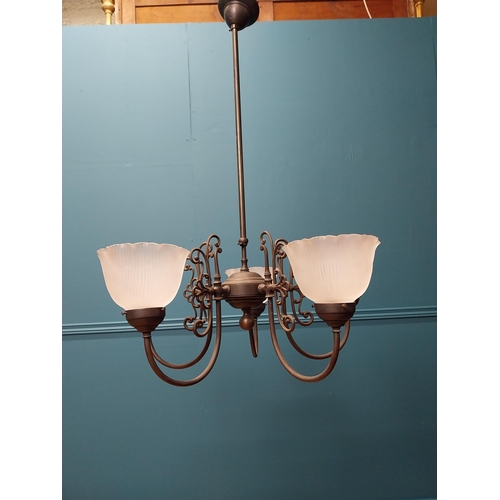 332 - Decorative five branch metal chandeliers with Holophane style glass  shades {85 cm H x 64 cm Dia.}.