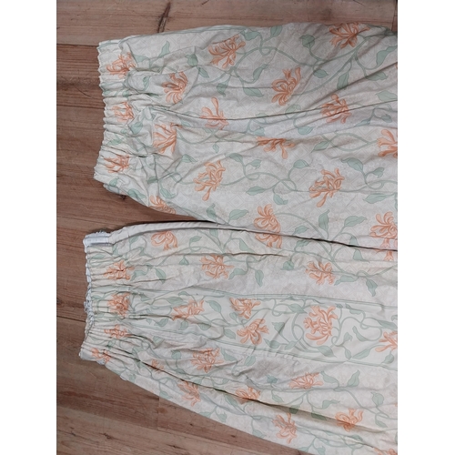 338 - Pair of floral fabric curtains with matching curtain ties {218 cm H x 220 cm W}.