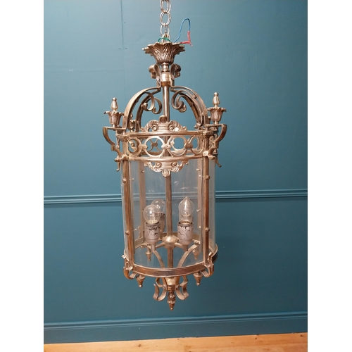 348 - Polished metal hall lantern with four lights { 68cm H X 80cm Dia }.