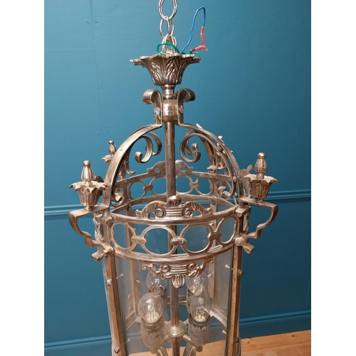 348 - Polished metal hall lantern with four lights { 68cm H X 80cm Dia }.