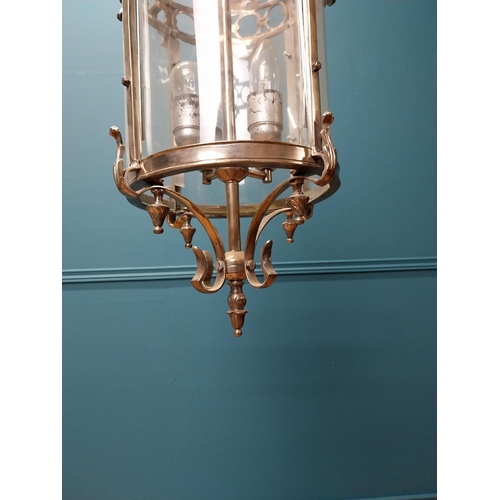 348 - Polished metal hall lantern with four lights { 68cm H X 80cm Dia }.