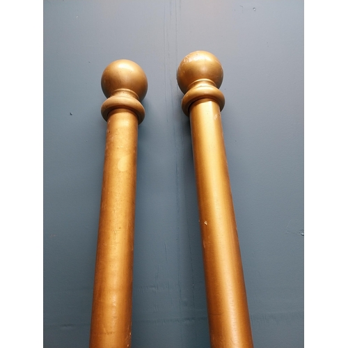 357 - Pair of wooden painted curtain poles {220 cm L x 10 cm Dia.}.