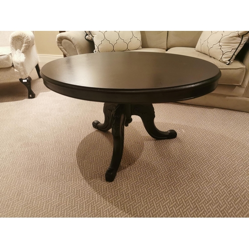 363 - Ebonised coffee table raised on turned column and outswept feet in the Victorian manner {63 cm H x 1... 